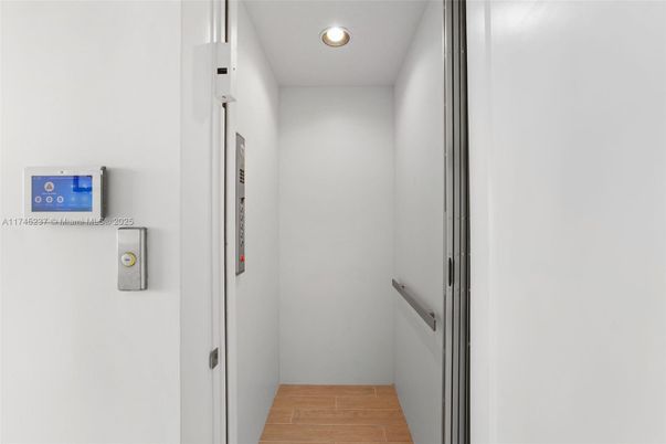 Elevator, Interior, Recessed Lighting, Wood Texture Flooring