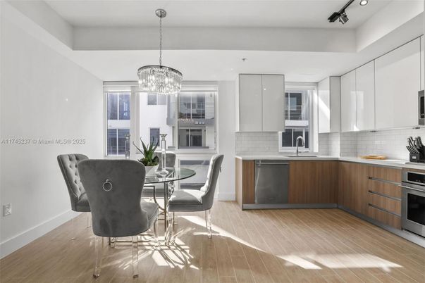 Chandelier, Dining room, Interior, Kitchen, Stainless Steel Appliances, Wood Texture Flooring