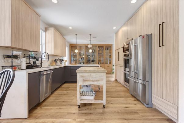 Interior, Kitchen, Pendant Lights, Recessed Lighting, Stainless Steel Appliances, Wood Texture Flooring