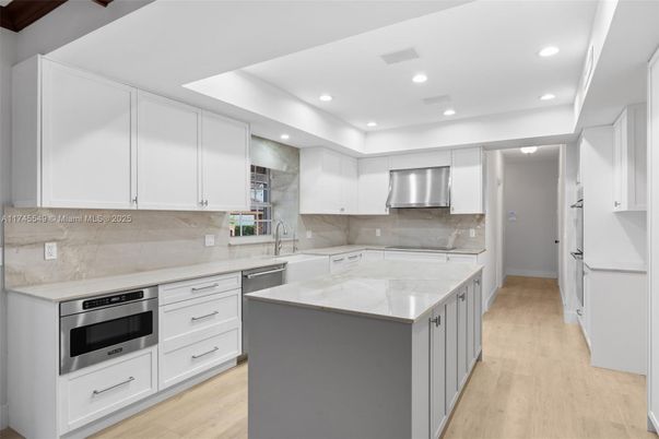 Interior, Kitchen, Recessed Lighting, Stainless Steel Appliances, Wood Texture Flooring