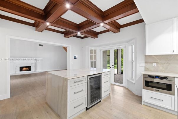 Fireplace, Interior, Kitchen, Recessed Lighting, Stainless Steel Appliances, Wooden Beams, Wood Texture Flooring