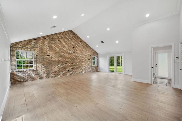 Empty room, Interior, Recessed Lighting, Stone Walls, Wood Texture Flooring