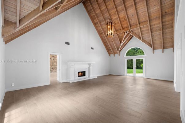 Empty room, Fireplace, Interior, Pendant Lights, Wooden Beams, Wooden Ceilings, Wood Texture Flooring