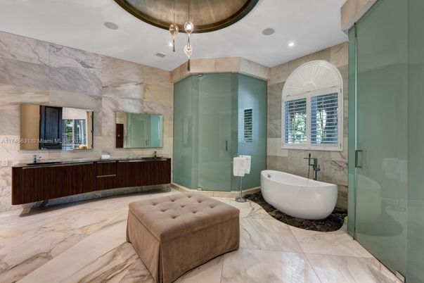 Bathroom, Dual Sink Vanities, Free Standing Baths, Glass Shower, Interior, Marble, Marble Walls, Pendant Lights, Recessed Lighting