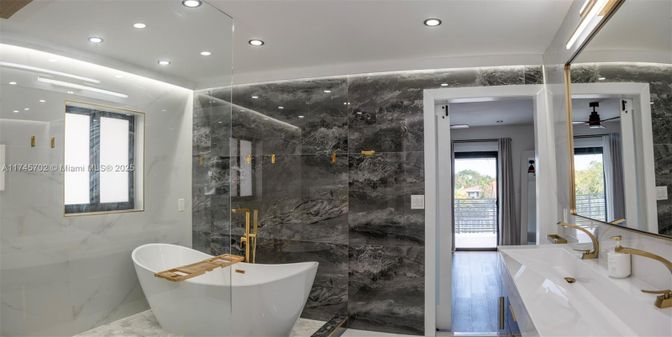 Bathroom, Free Standing Baths, Glass Shower, Interior, Marble, Marble Walls, Recessed Lighting