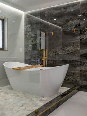 Bathroom, Free Standing Baths, Glass Shower, Interior, Marble, Marble Walls, Recessed Lighting