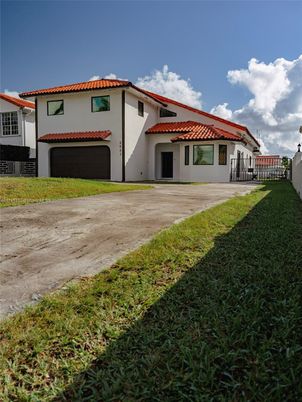 Attached, Backyard, Exterior, Facade, Spanish Mediterranean