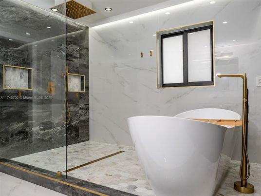 Bathroom, Free Standing Baths, Glass Shower, Interior, Marble, Marble Walls, Recessed Lighting