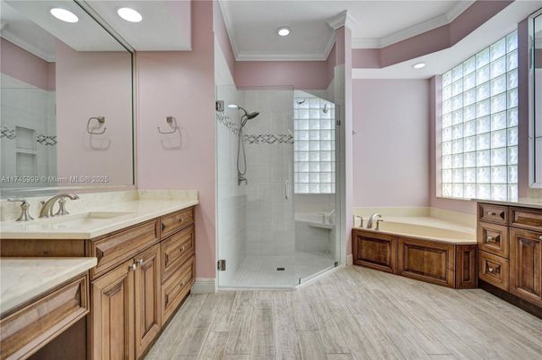 Bathroom, Dual Sink Vanities, Glass Shower, Interior, Recessed Lighting, Wood Texture Flooring