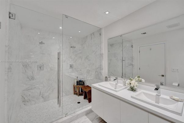 Bathroom, Dual Sink Vanities, Glass Shower, Interior, Marble, Marble Walls, Recessed Lighting