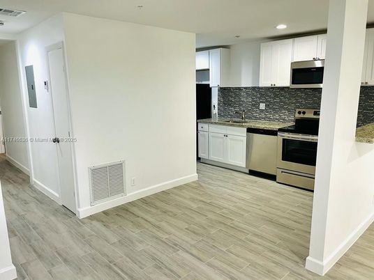 Interior, Kitchen, Recessed Lighting, Stainless Steel Appliances, Wood Texture Flooring