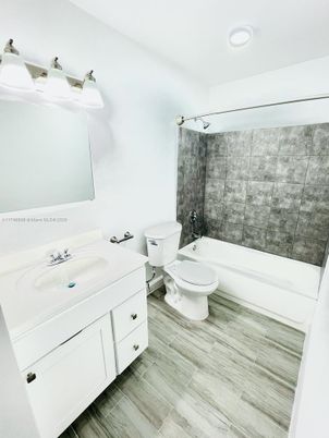 Bathroom, Dual Sink Vanities, Interior, Recessed Lighting, Wood Texture Flooring