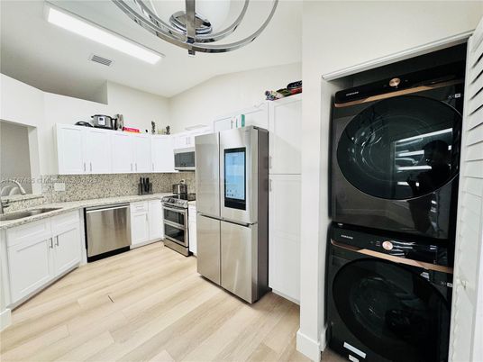 Interior, Kitchen, Stainless Steel Appliances, Washer, Wood Texture Flooring