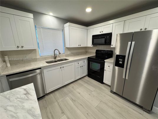 Interior, Kitchen, Recessed Lighting, Stainless Steel Appliances, Wood Texture Flooring