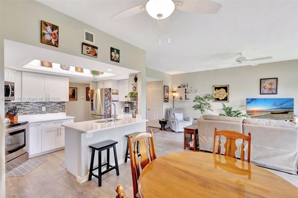 Dining room, Interior, Kitchen, Living room, Stainless Steel Appliances, Wood Texture Flooring