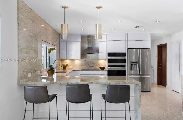 Interior, Kitchen, Pendant Lights, Recessed Lighting, Stainless Steel Appliances, Stone Walls