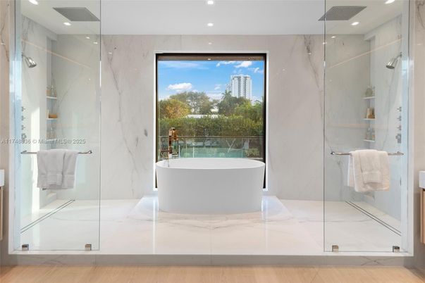 Bathroom, Free Standing Baths, Glass Shower, Interior, Marble, Marble Walls, Recessed Lighting, Wood Texture Flooring