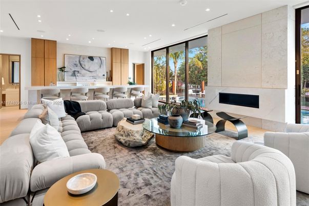 Fireplace, Interior, Living room, Marble Walls, Recessed Lighting, Wood Texture Flooring