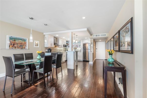 Dining room, Interior, Kitchen, Pendant Lights, Recessed Lighting, Stainless Steel Appliances, Wood Texture Flooring