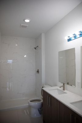 Bathroom, Dual Sink Vanities, Interior, Marble Walls, Recessed Lighting