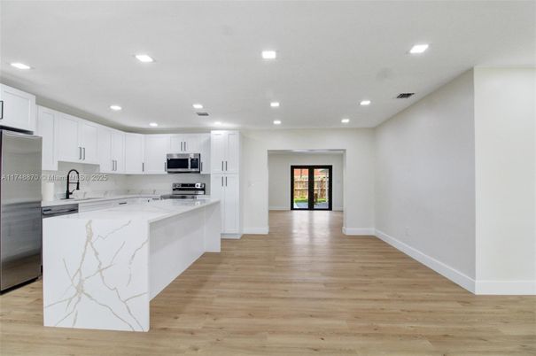 Interior, Kitchen, Recessed Lighting, Stainless Steel Appliances, Wood Texture Flooring