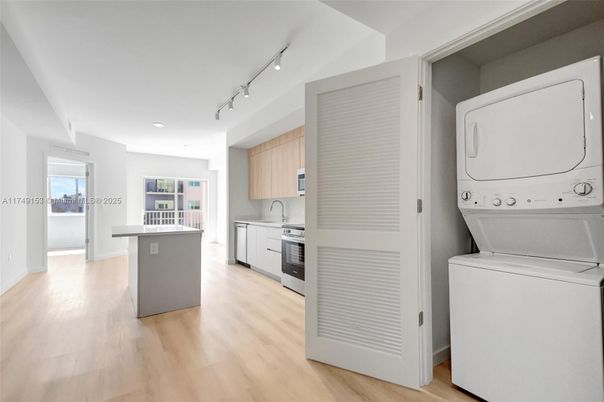 Interior, Kitchen, Recessed Lighting, Utility Closets, Washer, Wood Texture Flooring