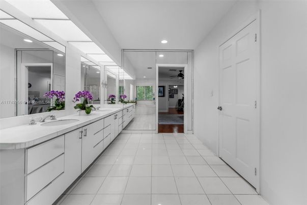 Bathroom, Dual Sink Vanities, Interior, Recessed Lighting, Tile Countertops