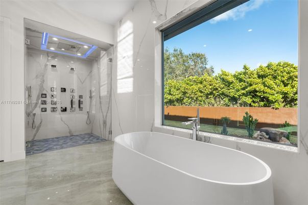 Bathroom, Free Standing Baths, Glass Shower, Interior, Marble, Marble Walls, Recessed Lighting