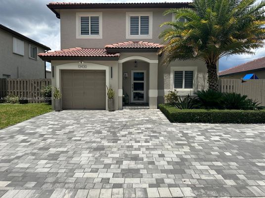 Attached, Exterior, Facade, Spanish Mediterranean
