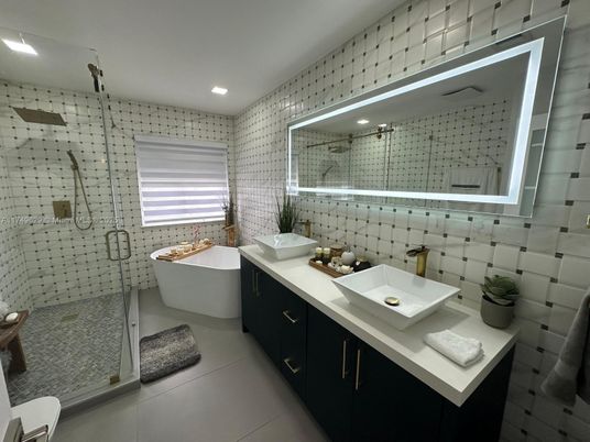 Bathroom, Dual Sink Vanities, Free Standing Baths, Glass Shower, Interior, Recessed Lighting