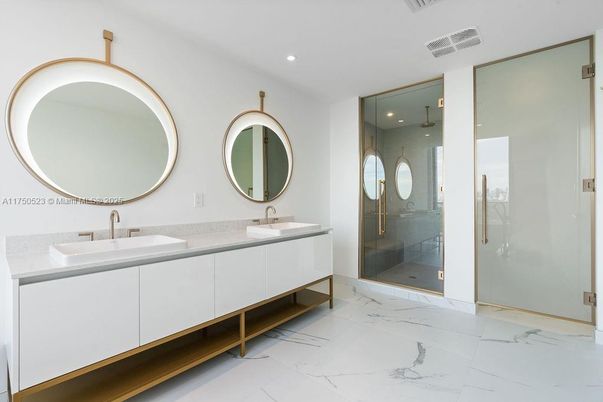 Bathroom, Dual Sink Vanities, Glass Shower, Interior, Marble, Recessed Lighting