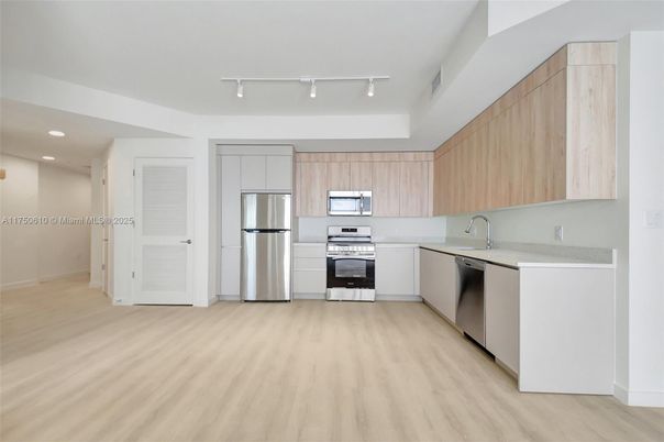Interior, Kitchen, Recessed Lighting, Stainless Steel Appliances, Wood Texture Flooring