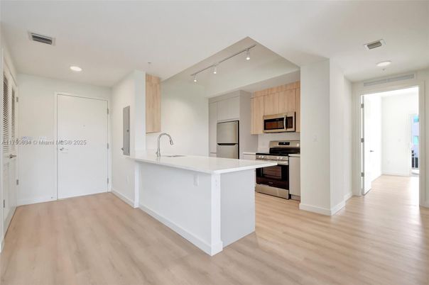 Interior, Kitchen, Recessed Lighting, Stainless Steel Appliances, Wood Texture Flooring