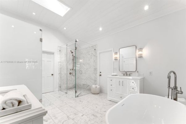 Bathroom, Dual Sink Vanities, Free Standing Baths, Glass Shower, Interior, Marble, Marble Walls, Recessed Lighting
