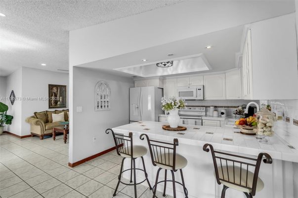 Interior, Kitchen, Recessed Lighting, Tile Countertops