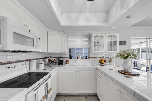 Interior, Kitchen, Recessed Lighting, Tile Countertops