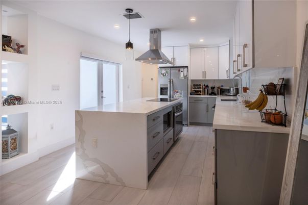 Interior, Kitchen, Pendant Lights, Recessed Lighting, Stainless Steel Appliances, Wood Texture Flooring