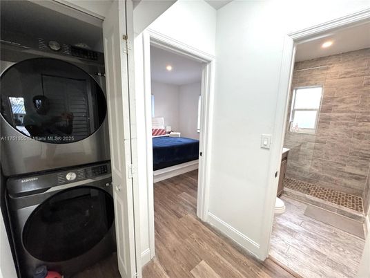 Bedroom, Interior, Recessed Lighting, Utility Closets, Washer, Wood Texture Flooring