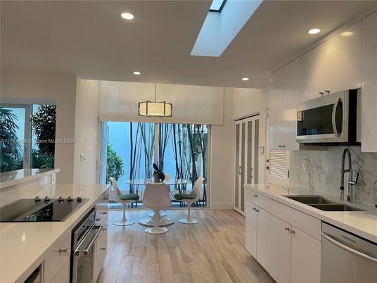 Dining room, Interior, Kitchen, Recessed Lighting, Stainless Steel Appliances, Water, Wood Texture Flooring