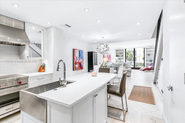 Chandelier, Dining room, Interior, Kitchen, Living room, Recessed Lighting, Stainless Steel Appliances, Wood Texture Flooring