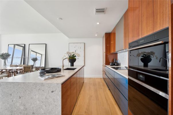 Dining room, Interior, Kitchen, Recessed Lighting, Stainless Steel Appliances, Wood Texture Flooring