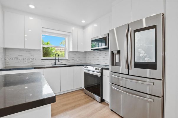 Interior, Kitchen, Recessed Lighting, Stainless Steel Appliances, Wood Texture Flooring