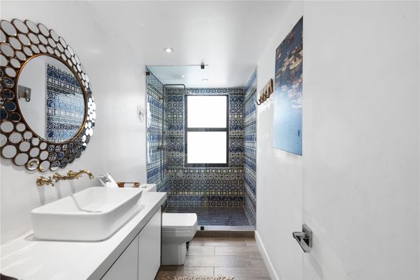 Bathroom, Dual Sink Vanities, Interior, Recessed Lighting, Wood Texture Flooring
