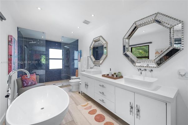 Bathroom, Dual Sink Vanities, Free Standing Baths, Glass Shower, Interior, Recessed Lighting, Wood Texture Flooring