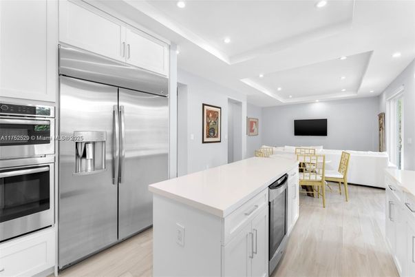 Dining room, Interior, Kitchen, Recessed Lighting, Stainless Steel Appliances, Wood Texture Flooring