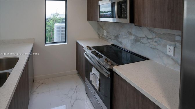 Interior, Kitchen, Marble, Marble Walls, Stainless Steel Appliances
