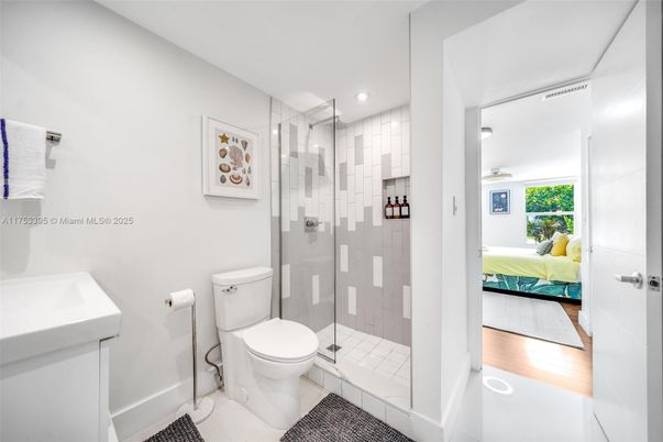 Bathroom, Bedroom, Glass Shower, Interior, Recessed Lighting, Wood Texture Flooring