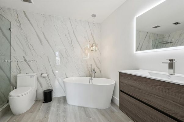 Bathroom, Free Standing Baths, Interior, Marble Walls, Pendant Lights, Wood Texture Flooring