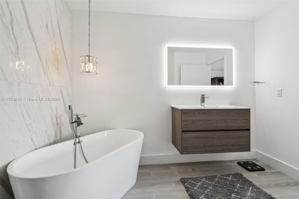 Bathroom, Free Standing Baths, Interior, Marble Walls, Pendant Lights, Wood Texture Flooring