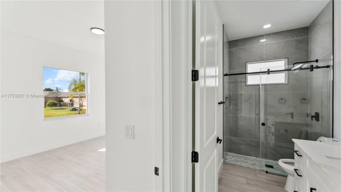 Bathroom, Glass Shower, Interior, Recessed Lighting, Wood Texture Flooring